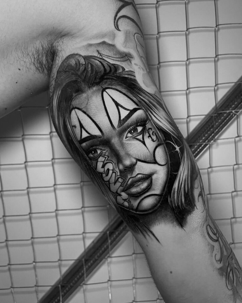 Tatuaje realismo realizado por Flama El Punto 08800, tatuador lettering españa